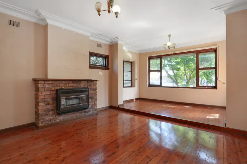 Living area at 12 Caroline St Kingsgrove, photo 1 of 2