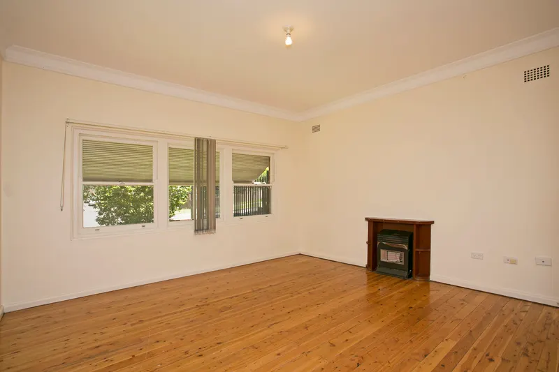 Living area at 12 Miller St Kingsgrove, photo 1 of 2