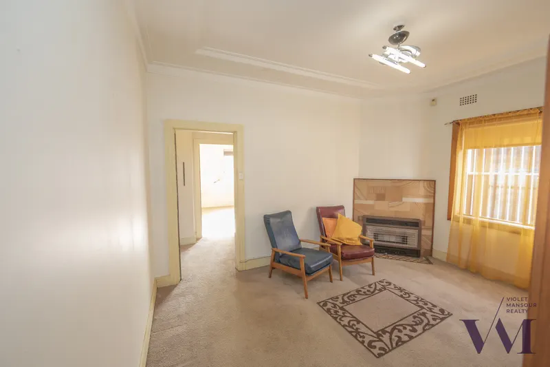 Living area at 8 McGrath Ave Earlwood